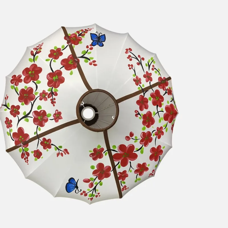 Đèn vải mười sáu múi vẽ tay hoa đào đỏ và bướm xanh, nẹp nâu, nhìn từ mặt đáy