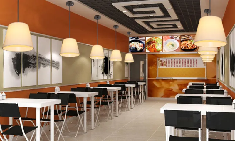 Đèn thả vải dáng khối nhiều mặt cắt hình học, vải vàng phát sáng ấm, các đường gân khung chia thân thành các múi tam giác và tứ giác